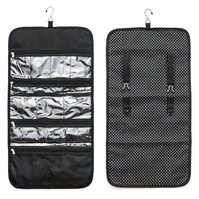 China Transparent Pvc Foldable Travel Toiletry Bag Dots Pattern Hanging Makeup Bag With Buckles for sale