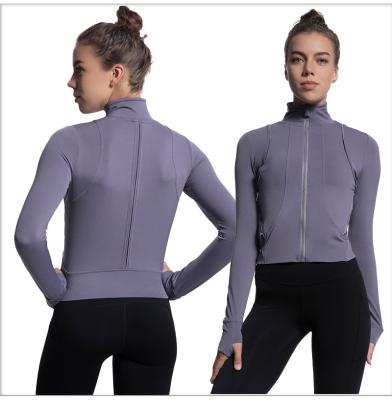 China Nylon+spandex yoga wear women's support collar zipper coat quick-drying sports slimming pocket yoga clothes for women for sale