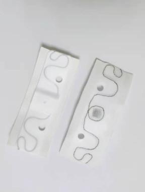 Cina RFID silicon gel laundry tag LAU002H , RFID UHF Laundry Tag 200 Times Washing Cycles ,  RFID laundry tag with holes in vendita