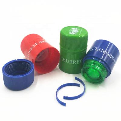 China Pilfer Proof 33*47 mm 33*58 mm Non Refillable Pile Proof Plastic Closures Vodka Whiskey Tequila Caps For Glass Bottles for sale