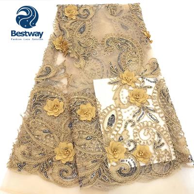 China Sustainable African Wedding Mesh Lace Gold Sequins 3D Flower Embroidery Lace Fabrics for sale