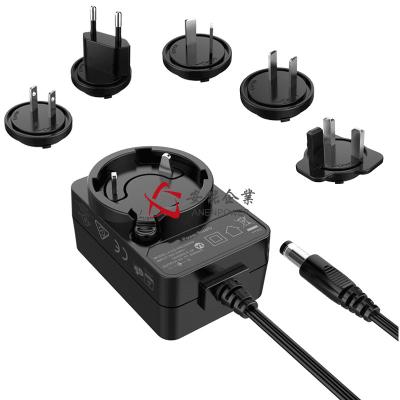 China 4 Plugs Interchangeable Power Adapter , 24V 0.5A Transformer Plug Adapter Level VI for sale