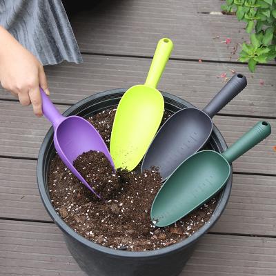 China Modern Plastic Spoon Dig Tool Yard Spade Trowel Garden Soil Scoop 4 Colors For Selection for sale