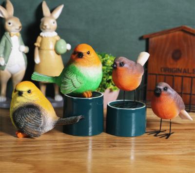 China Novelty garden fashion blackbird ornament simulation bird creative garden animal decoration for TV cabinet garden indoor outdoor decoration for sale