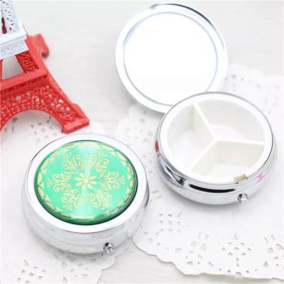 China Luxury Round Silver Metal Pill Storage Case Iron Pill Box For Medicine PB-002 for sale