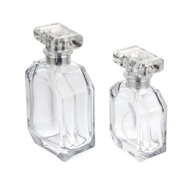 China Wholesale Cosmetic Perfume Bottle 100ml Transparent Super White Custom Glass Luxury for sale