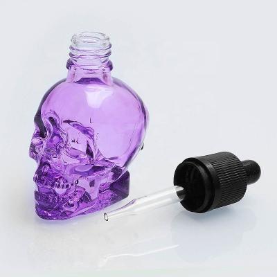 China Glass Dropper Cap 30ML 60ml Perfume Skull Dropper Bottle For Essential Oil Container for sale