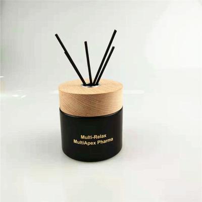 China Stocked Black 200ml Diffuser Botttle With Round Glass Tubular Diffuser Bottle for sale