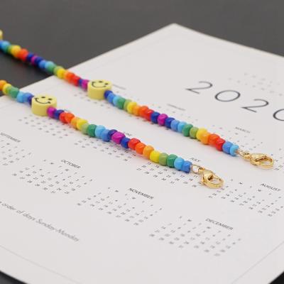 China Handmade Fasion Rainbow Bohemian Seed Beads Smiling Non-slip Glass Necklace Chain Holder for sale