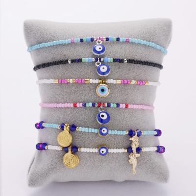 China Small Cute Fashion Bracelet Blue Eye Seed Bead Alloy Bracelet for sale