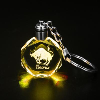 China New Year Gift Wholesale Cheap 12 Zodiac Taurus Crystal Key Chain Led Light Healing Crystal Key Chain For Healing Souvenir Gift for sale