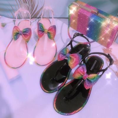 China 2022 New Trend Fashion Bow Flip Flop Crystal Slippers Beach Ladies Casual Shoes Rhinestone Slips Outdoor Women's Jelly Sandals for sale