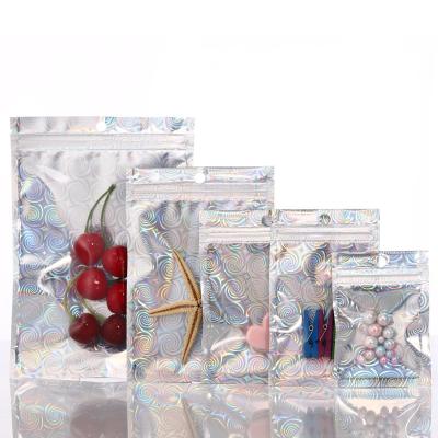 China 100pcs Color Changeable And Colorful Spiral Laser Self Seal Bag Moisture Proof Transparent Tea Dried Fruit Snack Food Packaging Bag Seal for sale