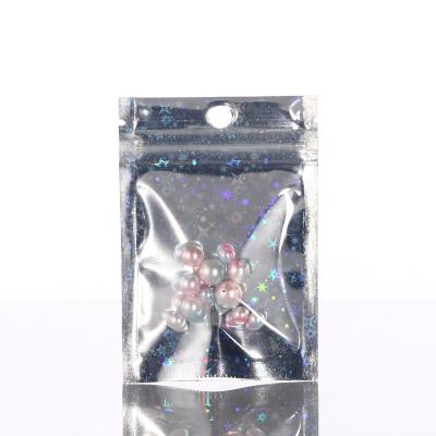 China Yin-Yang Laser Moisture Proof Bag Star 100PCS Cosmetic Tool Packaging Electronic Products Packaging Bag 7*10CM Spot for sale