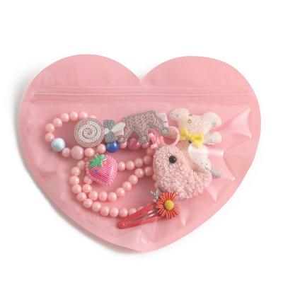 China 100 moisture proof zipper pockets in the form of plastic bag love pouch. Pink love, storage bag for sale