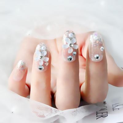 China Imported ABS Material 24 Pieces False Nail Tips Long Round Glitter Head Finial Wear Artificial Transparent Manicure for sale