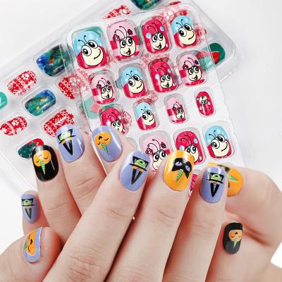 China Imported ABS Material Nail Art Child New 24 Pieces Cartoon Christmas Fake Nails Removable Nail Sticker With Adhesive for sale