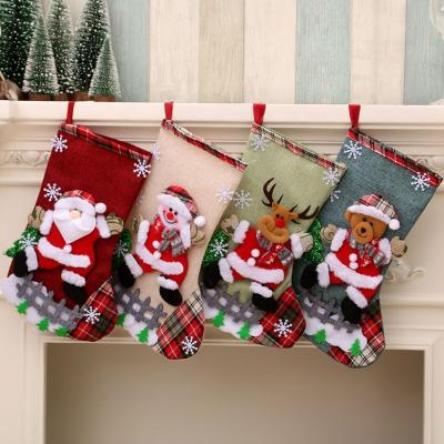 China Polyester Christmas Stocking Large Classic Christmas Stocking Santa Snowman Reindeer Family Holiday Party Decorations for sale