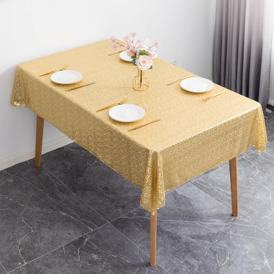 China Nordic hot sale style hotel restaurant waterproof decorated solid color embroidered gold round sequin tablecloth for sale