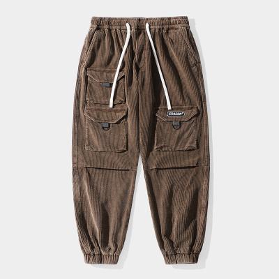 China Stereo Pocket With Lid GTW Brand Fashion Loose Pants Cloth Polyester Mens Trousers And Slacks for sale