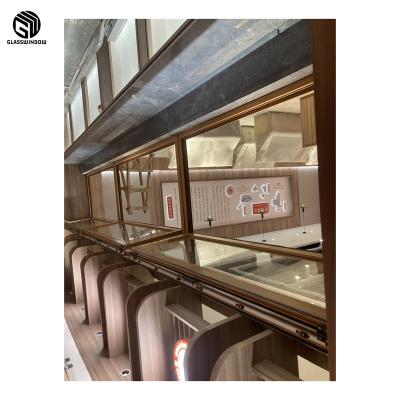 China Magnetic Good Quality Shatterproof Bifold Window Aluminum Tempered Glass Screen Bifold Windows for sale