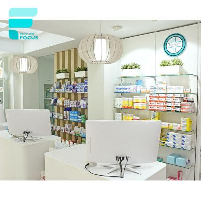 China Customized Modern Medical Pharmacy Furniture Interior Design Pharmacy Store Counter Design Retail Pharmacy Stand for sale