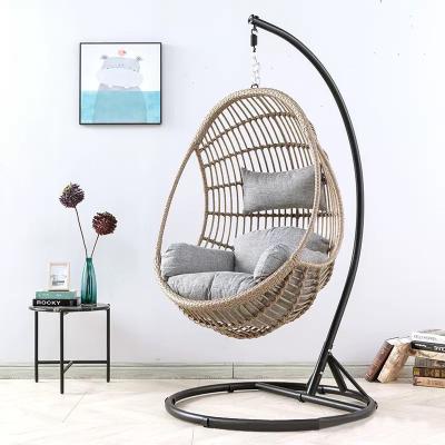 China Super Comfortable Outdoor Swing Chair PE Rattan Metal Bracket Hanging Garden Swing Weaving Chair With Arms for sale