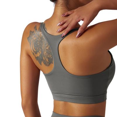 China Breathable Eco friendly Regeneration Running Sports Underwear I-shaped Fitness Racer Nude Naked back Bra Women's Yoga Top for sale