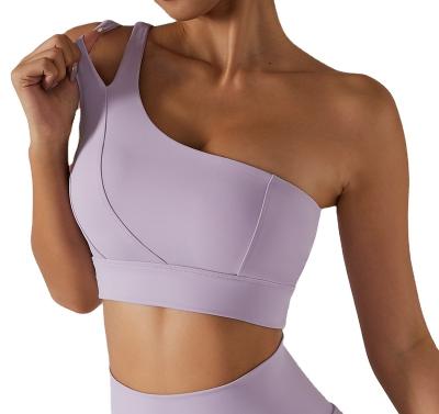 China Breathable Wholesale High Stretchy One Shoulder Strap Women Yoga Bra Top Fitness Workout High Impact Sports Bra for sale