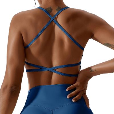 China Breathable sports sexy shoulder strap cross sling women tank top quick drying bare-feel friendly yoga bra for sale