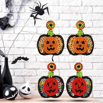 China Handmade Funny Beaded Pumpkin Earrings TRENDY Halloween New Design For Women Girls Halloween Jewelry Party Gifts for sale