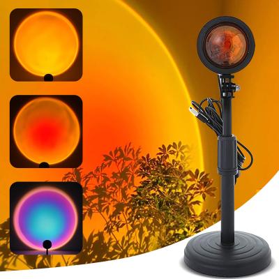 China Dropshipping Modern Wholesale RGB Bedroom Robot LED Sunrise Rainbow Projector Light Living Room Table Sunset Projection Lamp for sale