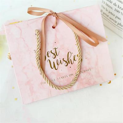 China Recyclable Personalized Small White Marble Giftbag Custom Logo Printed Luxury Wedding Premium Paper Jewelry Gift Bags With Ribbon Handle for sale