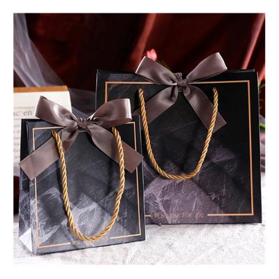 China Recyclable custom logo oem boutique jewelry gift shop black silver red glossy laminated high end large retail paper bag for shops for sale