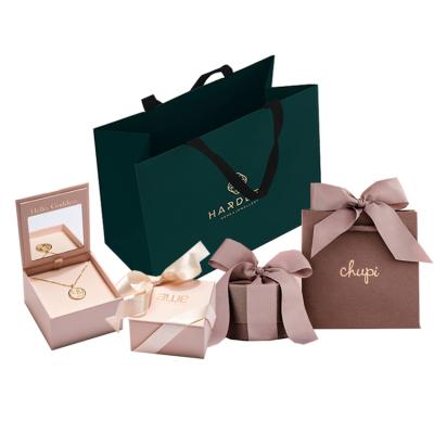 China Custom Printed White Eco-friendly China Manufacturer Luxury Gift Shopping Jewelry Paper Bag With Your Own Logo for sale