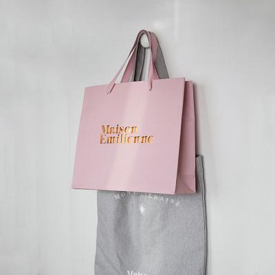 China High Quality Recyclable Hot Sales Gold Foil Logo Paper Bags For Hair Extension Customized Packaging for sale