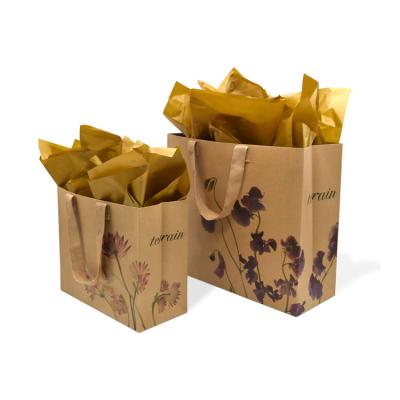 China Recyclable Custom Logo Paper Kraft Shopping Packaging Bag With Handle for sale