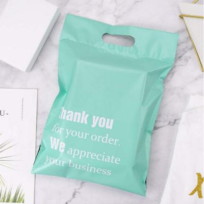 China Eco-Friendly Packaging / Tearproof / Strong Clothing Handle Adhesive / Perfect Printing Apparel T-Shirt Printing Mailing Bags Poly Starch Postage Ads With the logo for sale