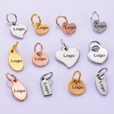 China FASHIONABLE custom round plain famous brand logo mud phone jewelry charms custom bracelet ear charms designer pendants for bracelet diy for sale