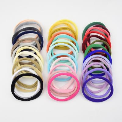 China Spandex 30 Colors 100pcs Nylon Seamless Headband For Baby Stock Infant Elastic Hair Band Kids DIY Headwear Children Hair Accessories for sale