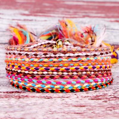 China Vintage 100 Pcs Handmade Tibetan Cotton Braided Rope String Bracelet Friendship Tassel Bracelet For Men Women Gift Beads Bracelet for sale