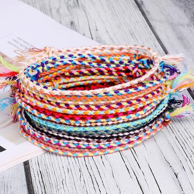 China Vintage 100 Pcs String Bracelet Cotton Yarn Tassel Handmade Tibetan Rope Woven Bracelets For Women Men Ethnic Bracelet Jewelry for sale