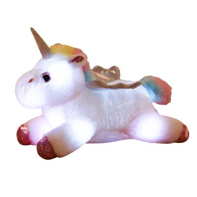 China Gift New Arrival Night Glowing Musical Colorful Lights Led Soft Unicorn Plush Pillow Toy for sale