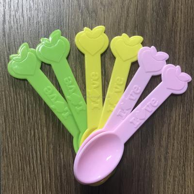 China New Year Plastic Meal Christmas Utensils Birthday Party Decorations Spoon Disposable Heart Shaped Spoon Bombs Birthday Utensils for sale