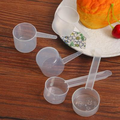 China Viable plastic liquid measuring scoop 30ML scale 15G 30CC protein powder milk powder measuring scoop for cooking kitchen for sale