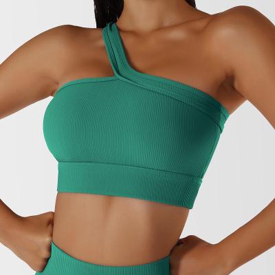 China Breathable Yoga Bra Workout Padded One Shoulder Sports Bra Womens Cropped Tank Top Yoga Sexy Sleeveless Crop Tops Gym Wear Activewear for sale