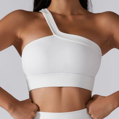 China Breathable Women's Sexy Yoga Bra Workout Padded One Shoulder Crop Sports Bra Cut Out Tank Top Sexy Sleeveless Crop Tops Sports Wear Activewear gymnasium for sale