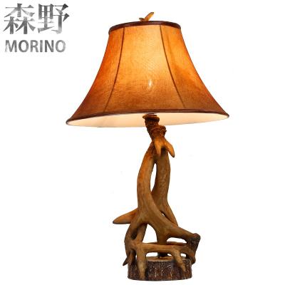 China 2018 American country style new year style desk lamp antler antique wooden table lamp for hotel decoration table lamp for sale