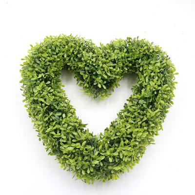 China Home Garden Office Wedding  Decoration Wedding Decoration Plastic Hanging Greenery Leaves Heart Shaped Garland Artificial Wreath for sale