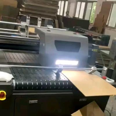 China Popular GH2220 heads small format 0609 uv led flatbed printer with high quality Sunthinks Manufacturer for sale